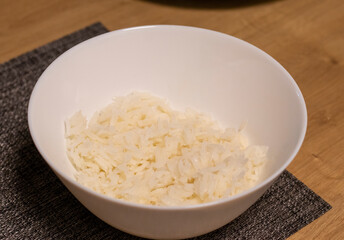 Close up shot of the cooked white rice in the bowl. Food