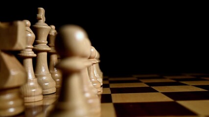 closeup of opening move in chess, slow motion - Powered by Adobe