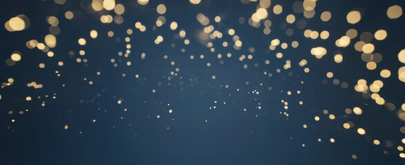 holiday illumination and decoration concept - christmas garland bokeh lights over dark blue background
