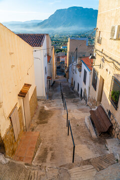 Narrow town street in Elche de la Sierra, Albacete (Spain). 