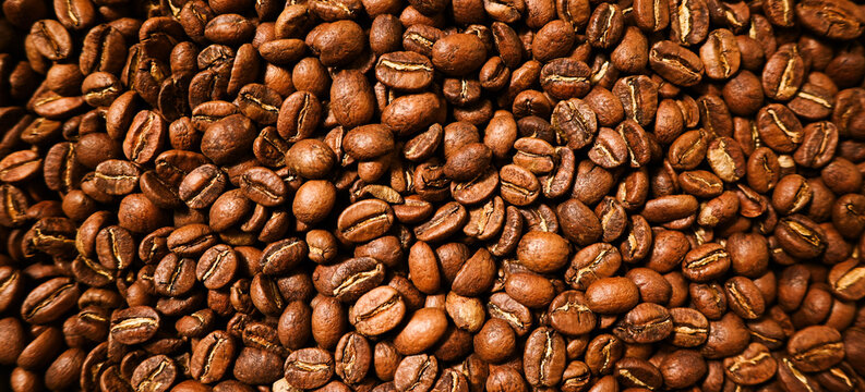 Roasted Coffee beans texture. Espresso ingredient. Food and drinks background
