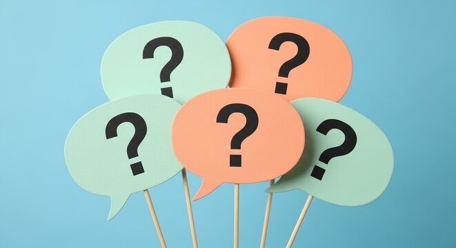 A collection of speech bubbles with question marks on sticks against a blue background - Powered by Adobe