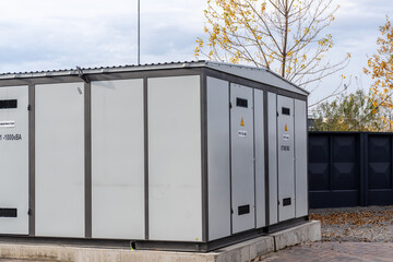 Industrial electrical equipment storage unit in a modern facility during daylight hours in autumn