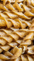 wholemeal pasta with visible details. background or textura
