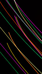 colored lines on a black background.textura