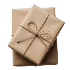 Stacked brown kraft paper packages tied with rustic twine bow