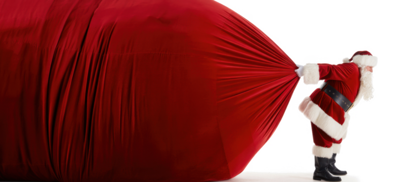 Santa Claus pulling huge bag of presents isiolated on white background with copy space
