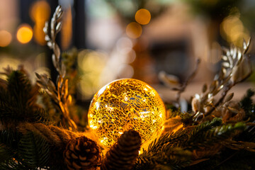 Warm Glowing Mercury Glass Sphere in Rustic Christmas Garland