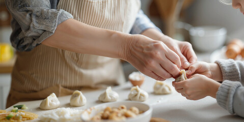 close-up of grandmother's wrinkled hand teaching granddaughter to fold a perfect dumpling. Warm natural light, blurred kitchen