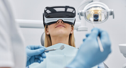 Patient wearing VR headset during dental treatment in modern clinic.