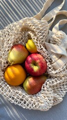 fruits in a string bag