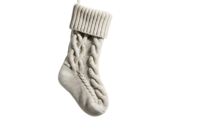 Cozy knitted christmas stocking with cable knit pattern isolated on transparent background