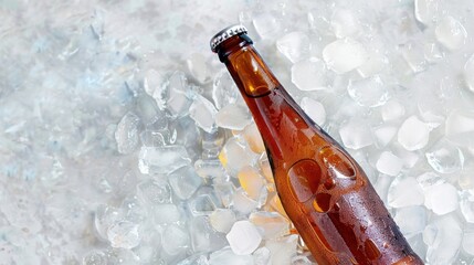 A brown glass bottle rests on a bed of ice cubes. The bottle is chilled and has condensation on its surface, suggesting a refreshing beverage.