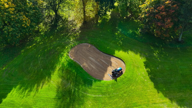 Drone view of autumn golf course in Germany - Powered by Adobe