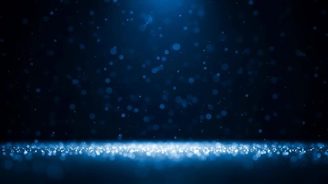 Blue glitter particles falling shimmer on reflective surface abstract background loop.