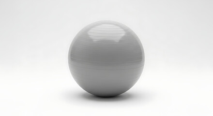 A gray exercise ball centered on a white surface in a studio setting with soft lighting all around it ai generated