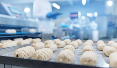 Automated production of puff pastry buns, dough formation and quality check in confectionery...