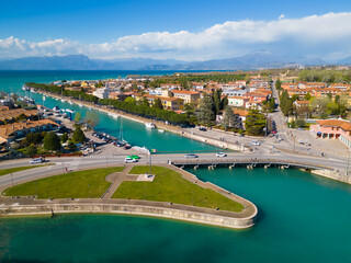 Drone view of the picturesque town of Peschiera del Garda, located on the southern edge of Lake Garda, Italy.