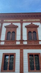 Architectural Facade: An image of a historical building facade showcases intricate architectural details, embodying classical design, elegance, and cultural richness.