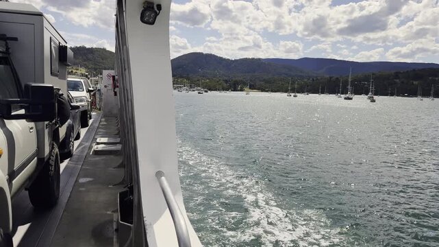 car ferry crossing from Kettering Tasmania to Bruny island, a popular travel destination along the coastline of the Tasman sea, Australia.
