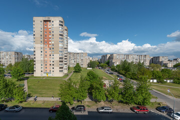 Residential Apartment Block Surrounded by Greenery on a Clear Day