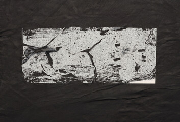 Torn, ripped paper pieces blot crack crumble frame. Black, beige copy space texture poster background.