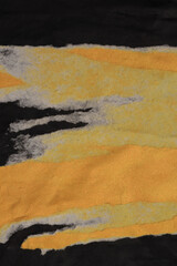 Torn, ripped paper pieces blot crack crumble frame. Black, yellow copy space texture poster background.