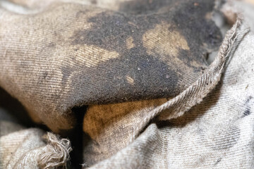 Close up photo of an old oily rag