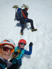 Selfie of a family on a snowy slope
