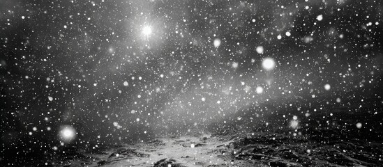 Obraz premium Snowy landscape with a bright star in the sky. The snow is falling and the sky is dark
