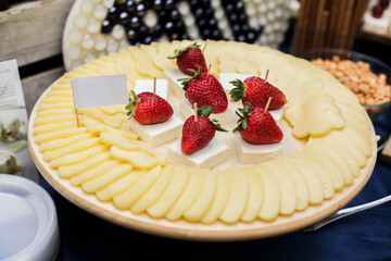 Cheese and strawberries