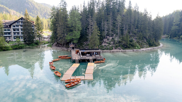 Scenic view of Lago di Braies with wooden boats