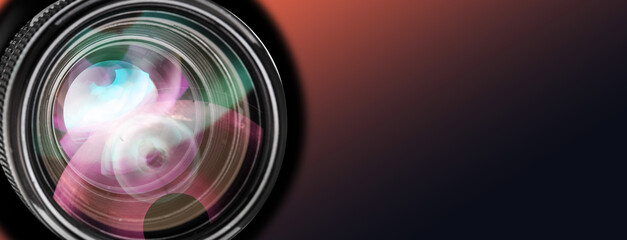 Camera lens against color gradient background, closeup. Banner design with space for text