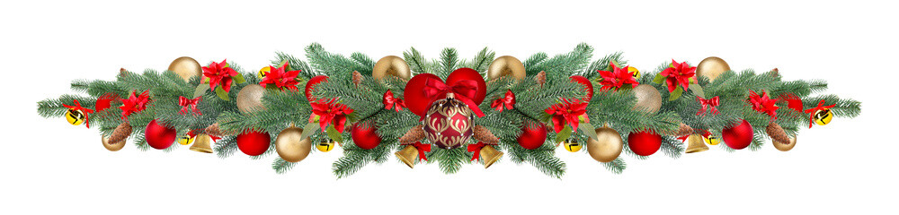 Christmas tree branches with festive ornaments isolated on white