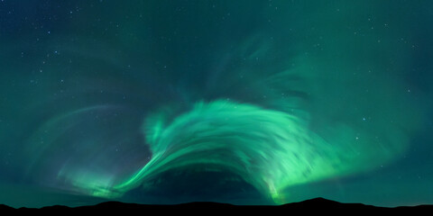 Enchanting aurora borealis green wave in night sky