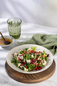 Frisee and arugula salad with pear and blue cheese