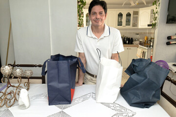 Adult man happy with his purchases