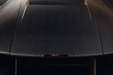 Carbon hood of sportcar close up