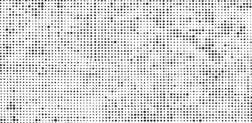 Black and white halftone texture with random dots. Abstract monochrome background with a pixel grid pattern, creating a digital noise effect for modern design