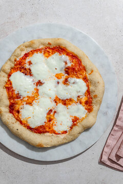 Delicious pizza with mozzarella and burrata cheese
