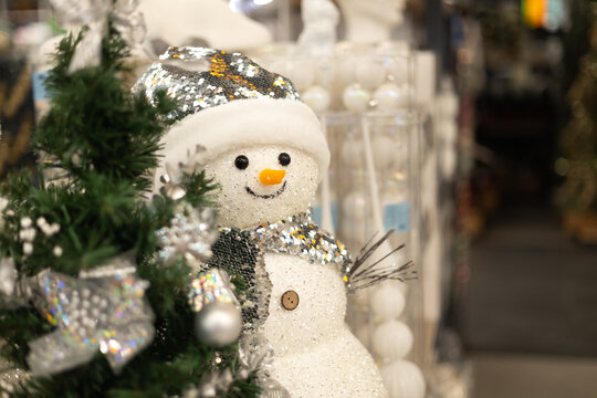 Sparkling Snowman Display in a Festive Toy Store