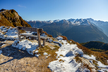 Autumn scenery in the European Alps with snowy peaks