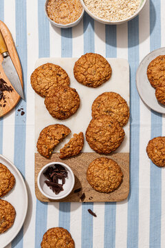Delicious chocolate oat cookies on striped linen