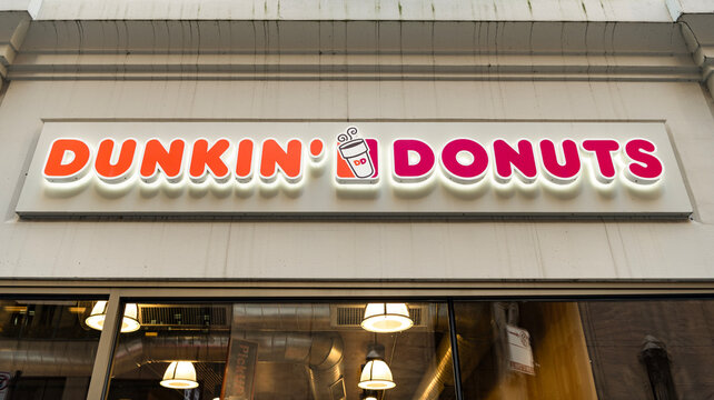 Chicago, Illinois, USA - October 08, 2024: Dunkin Donuts brand logo. Logo of trademark brand of coffee and doughnut named Dunkin Donuts. Logotype of Dunkin Donuts coffeehouse