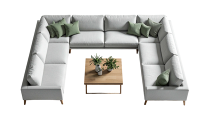 U-shaped couch w/ green pillows, wooden table