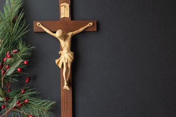 Crucifix and christmas border on black