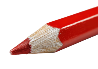 Red pencil's sharpened point, close-up against black backdrop