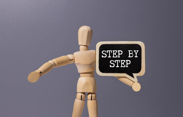 Next Steps Text on magnifying glass with keyboard and open notepad