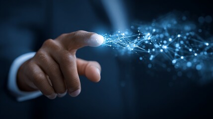 Hand touching a glowing, networked sphere in dark blue