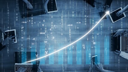 A dynamic workspace showcasing a team collaborating over laptops and tablets, analyzing data trends and graphs, emphasizing project management and strategic growth. Copula